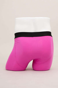 Rear view of hot pink boxer briefs with black waistband on mannequin