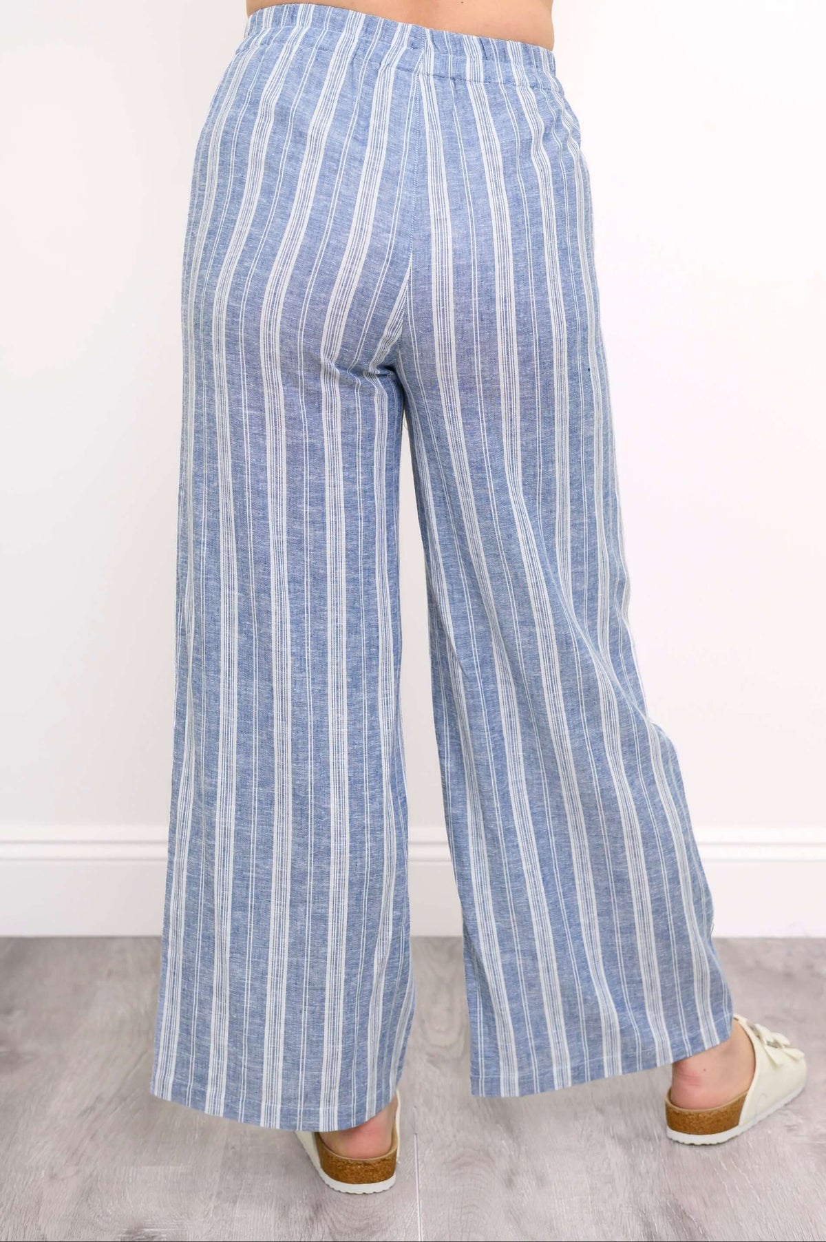 Back view of Parker blue striped wide-leg pants with elastic waist