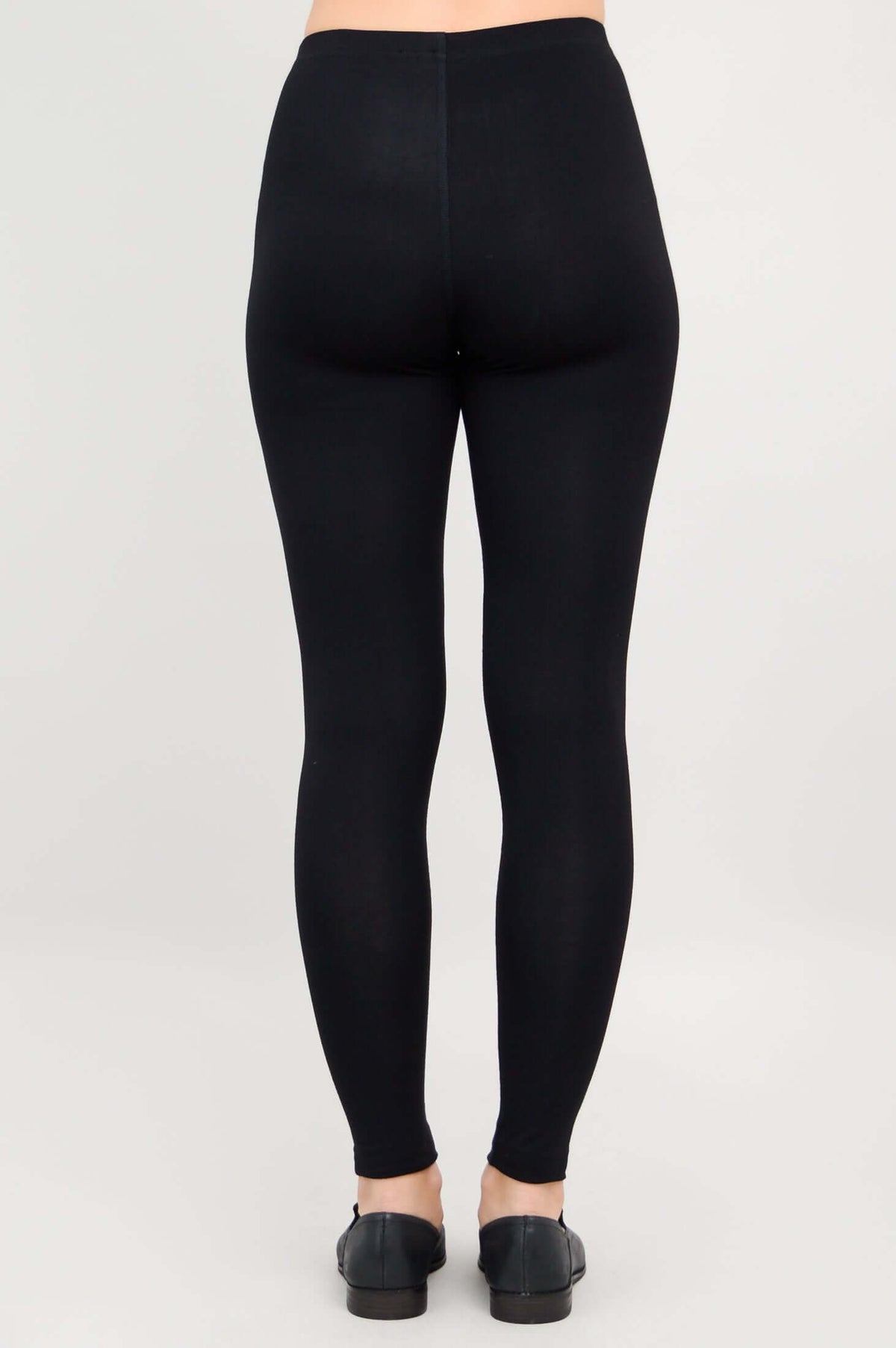 Back view of black Ruby leggings highlighting fit and coverage