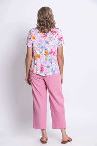 Back view of the Samantha linen bamboo shirt paired with pink pants