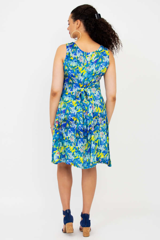 Back view of Sara blue floral dress showing tie-belt