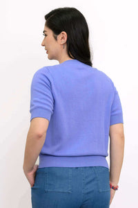 Back view of woman wearing the Shen short sleeve cardigan