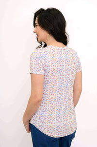 Back view of Tessa Tee with confetti dot print, showing rounded hem and short sleeves