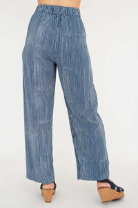 Back view of blue striped pants with relaxed fit and elastic waistband