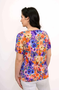 Back view of woman showing the floral bamboo pattern on the top