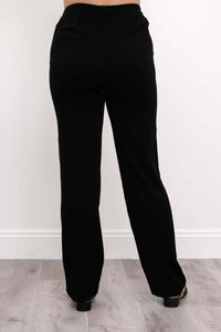 Back view of black bamboo-linen trousers with straight leg style