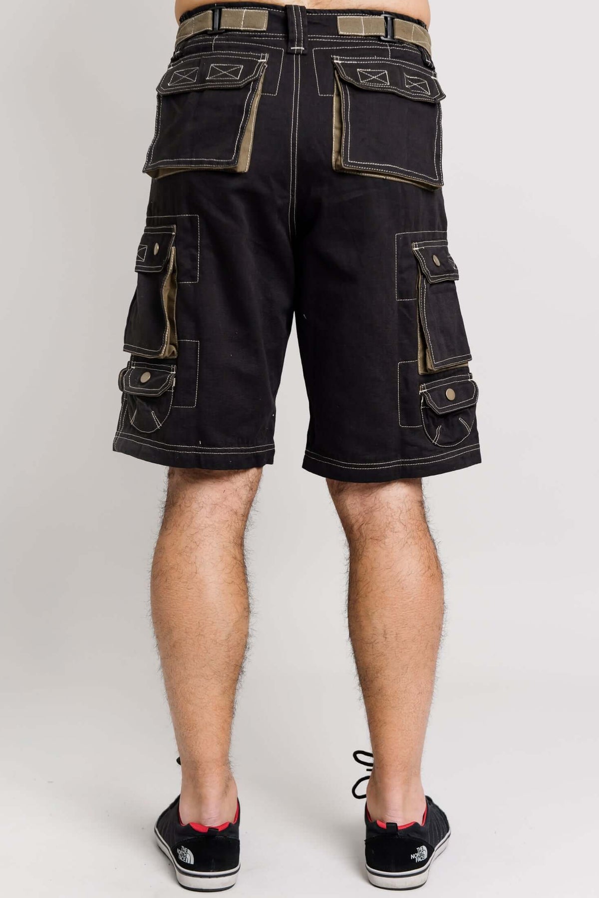 Back view of black cargo shorts highlighting rear pockets and belt loops