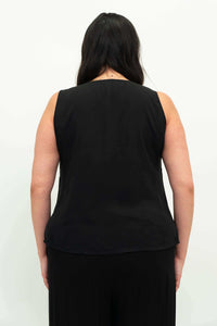 Back view of model wearing a black sleeveless tank top