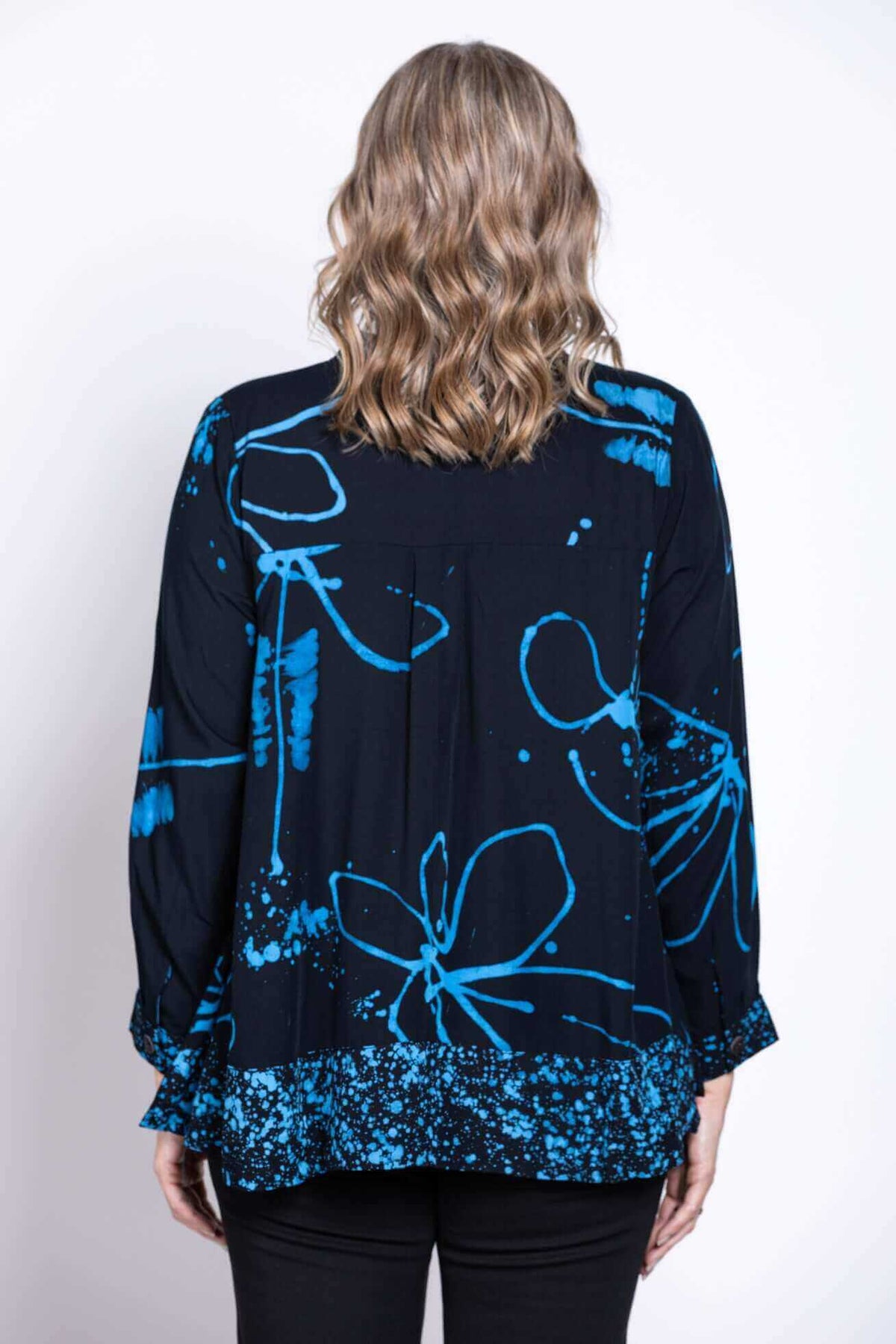 Back view of blue Batik print blouse with artistic pattern on fabric