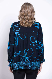 Back view of blue Batik print blouse with artistic pattern on fabric