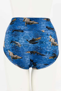 Back view of blue high-waisted alligator print women's brief on mannequin