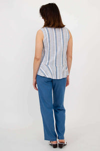 Back view of a woman in a blue and white striped peplum tank top