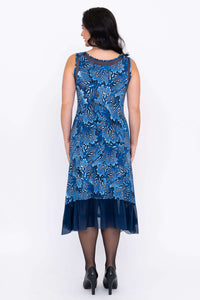 Back view of blue floral mesh midi dress showing layered mesh hem