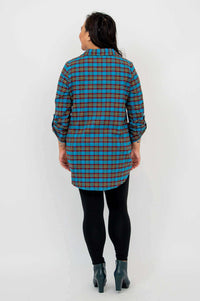 Back view of blue plaid oversized flannel tunic