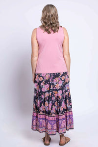Back view of tiered floral maxi skirt and pink sleeveless top