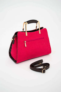 Back view of crimson satchel bag showing rear zipper pocket and detachable strap