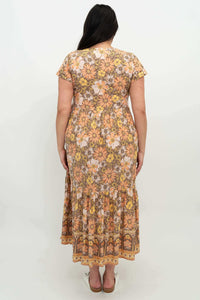 Back view of model wearing floral Sharpie Dress displaying the overall print and fit