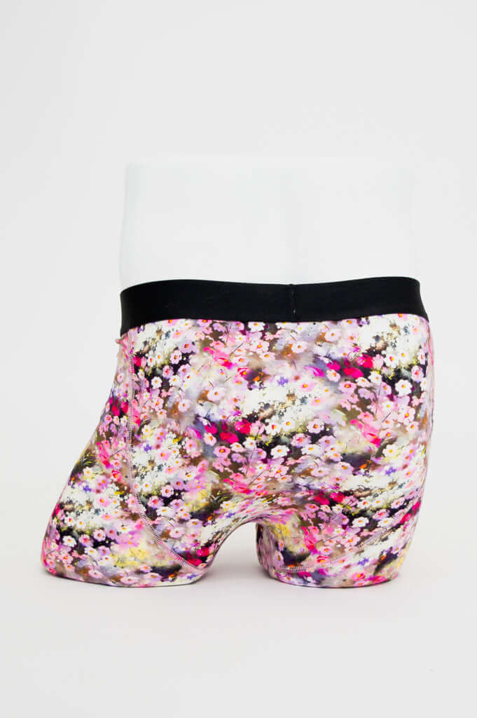 Back view of floral print men's boxer briefs highlighting the stretchy waistband
