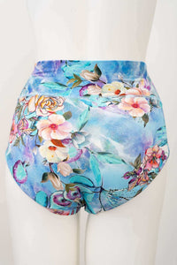 Back view of high waisted bamboo brief featuring colorful flowers