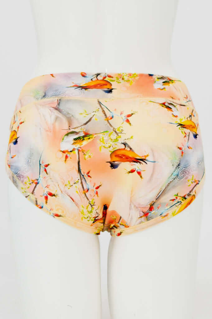 Back view of hipster bamboo underwear adorned with vibrant songbird pattern