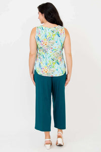 Back view of model displaying full length and hem of Ritzy Tank in floral print