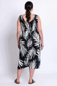 Back view of model in black and white Springbok jumpsuit showing full length
