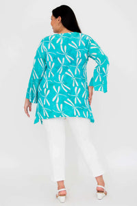 Back view of model wearing aqua blue boho top with dragonfly print