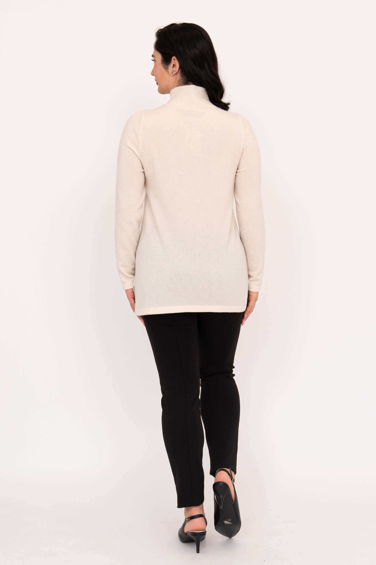 Back view of model wearing cream Simmon Sweater