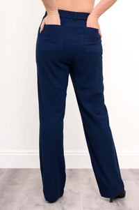 Back view of navy Melodie pants showing elastic waistband and patch pockets