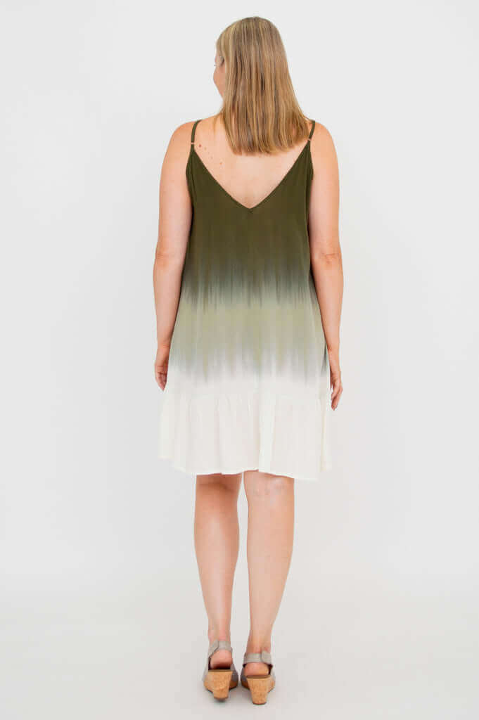 Back view of olive ombre tiered dress with V-back neckline