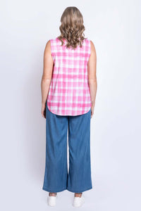Back view of pink plaid sleeveless tank top on woman with wavy hair