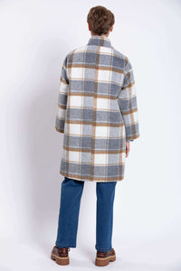 Back view of plaid wool coat showing length and pattern