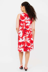 Back view of woman in red floral dress highlighting floral print and fit