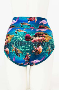 Back view of sea turtle reef print high-waist brief on mannequin