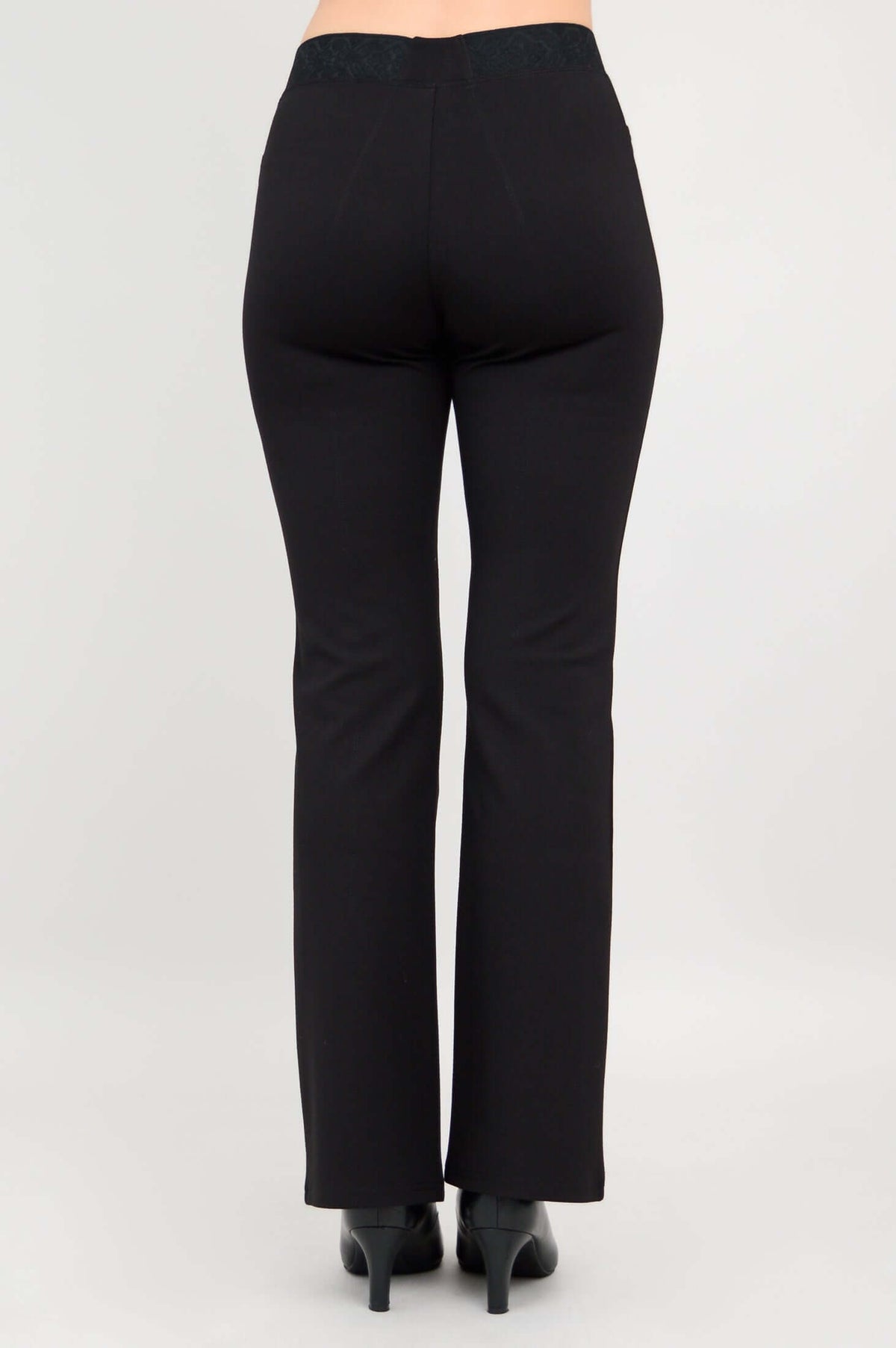 Back view of black tailored pants showing waistband and seam details