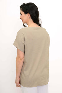 Back view of woman wearing a taupe linen-blend tee with short sleeves