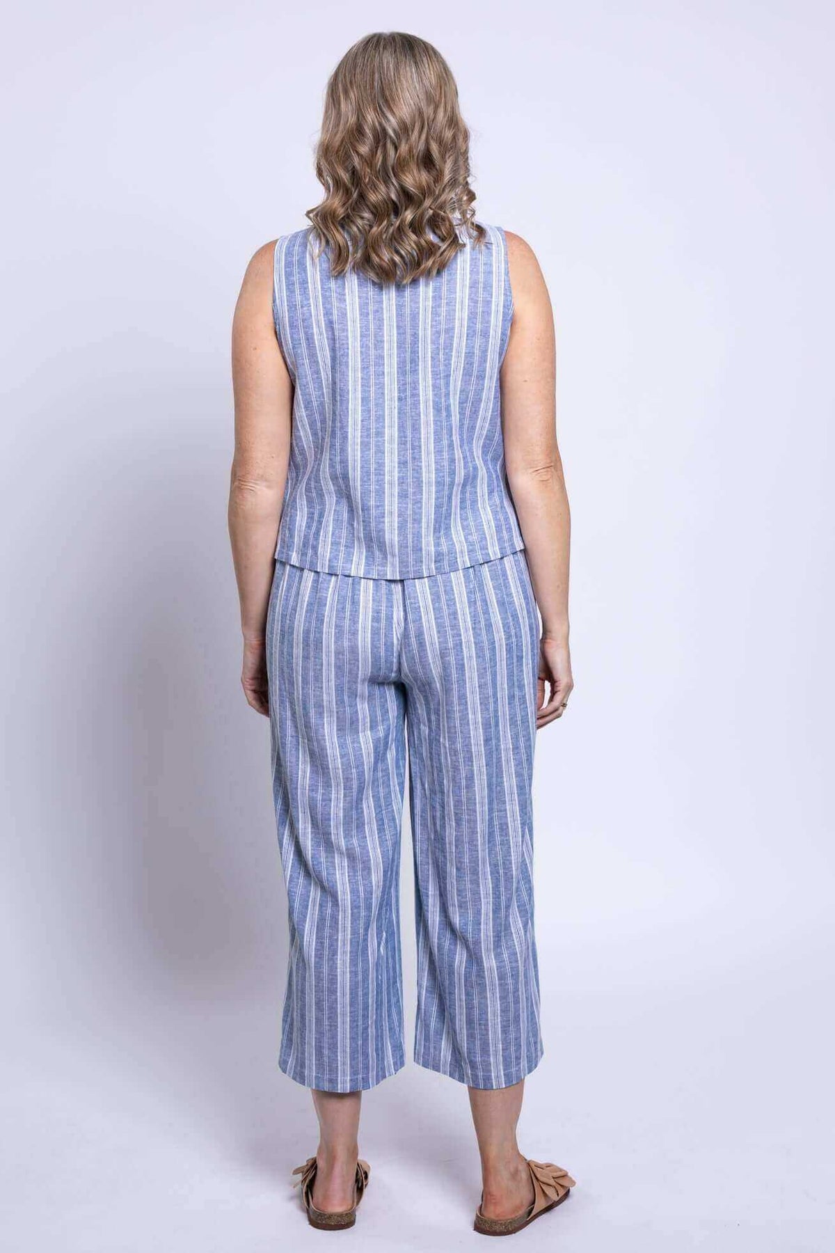 Back view of woman in Landon cropped capri pants and matching top