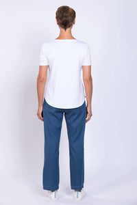 Back view of woman wearing Marla Tencel Pants with white sneakers