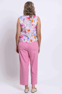 Back view of woman in floral bamboo-linen tank top and pink pants