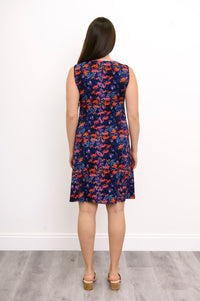 Back view of woman in navy floral sleeveless dress