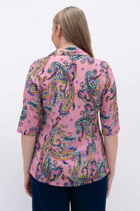 Back view of woman in pink paisley blouse, highlighting fit and princess seams