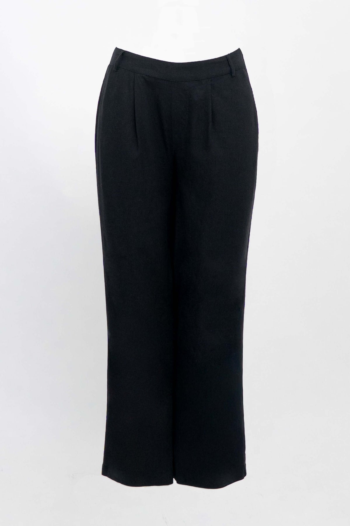 Black pleated trousers with belt loops and wide-leg fit displayed against a white background