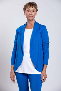 Front half-length view of woman in blue open front French Terry jacket