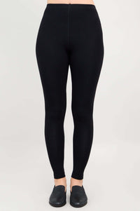 Center front view of black Ruby leggings worn by model