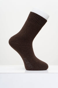 A single dark brown crew sock displayed on a white mannequin foot against a clean white background.
