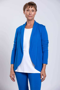 Close-up front view of woman modeling a blue French Terry open jacket over a white shirt