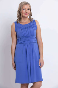 Close-up front view of violet ruched dress showing bodice details and pockets