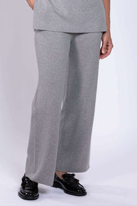 Close-up front view of grey Bailey track pants with straight-leg cut