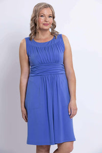 Close-up front view of blue ruched dress highlighting bodice and waistband details