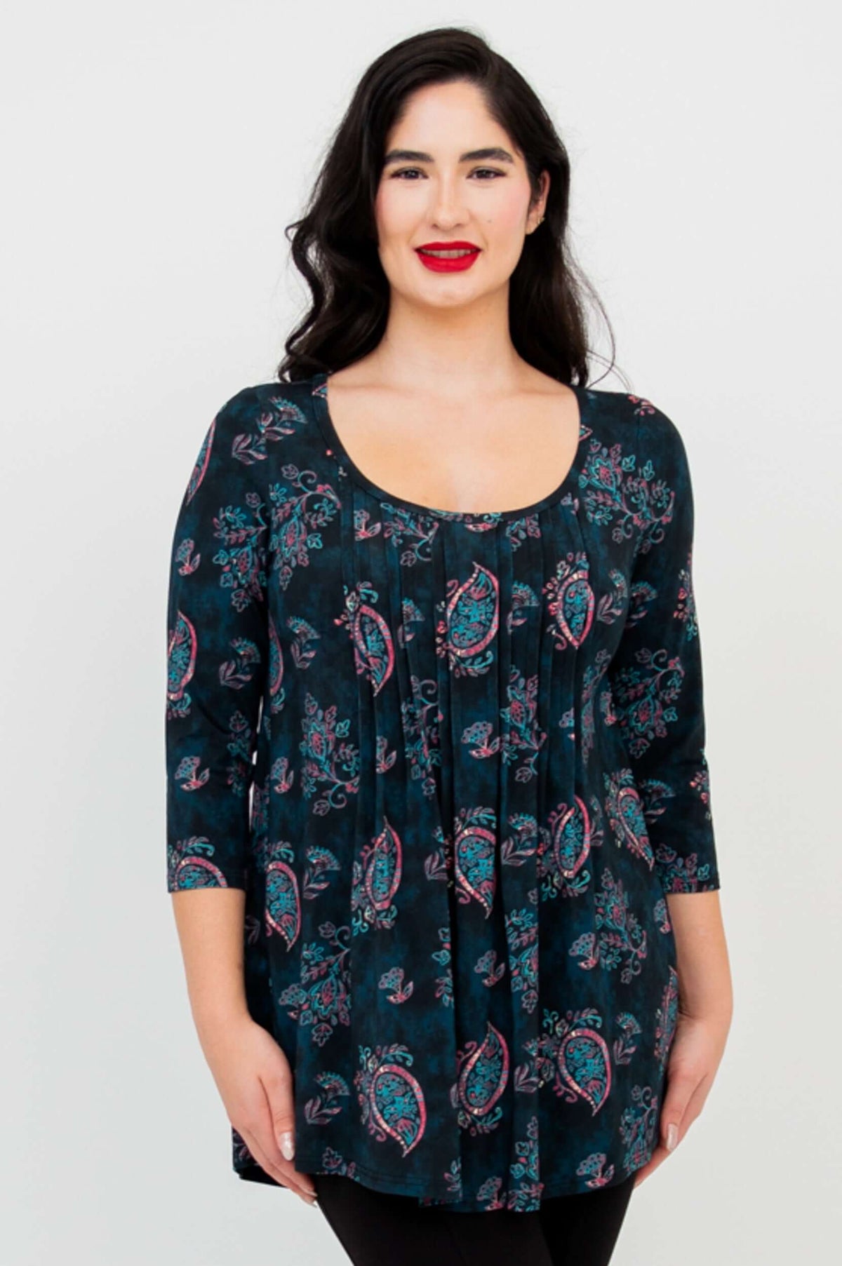 Close-up front view of Peyton Top's pattern, pleats and neckline